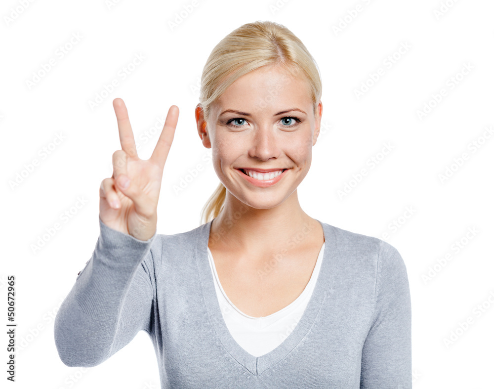 Female peace gesturing with hand, isolated on white Female peace gesturing with hand, isolated on white