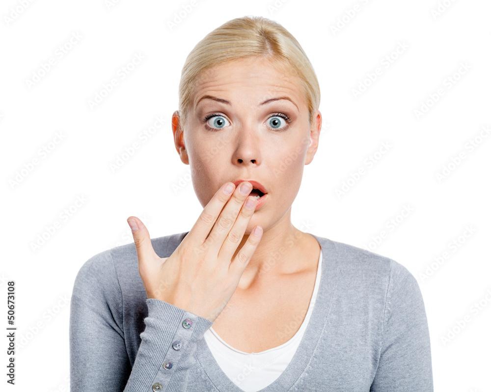 Shocked girl covers her opened mouth with hand Shocked girl covers her opened mouth with hand