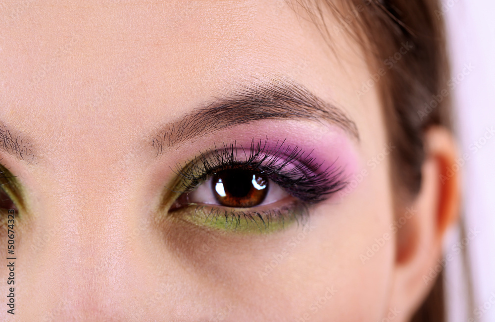 Fototapeta premium Beautiful female eye with bright make-up