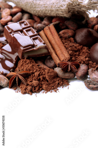 Composition of chocolate sweets, cocoa and spices, isolated