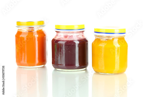 Baby puree in jars isolated on white