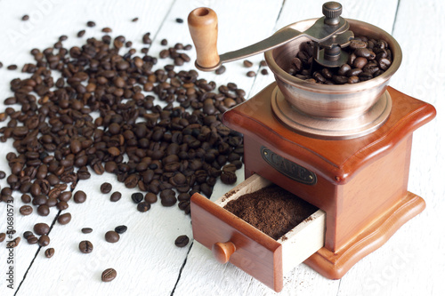 Coffee and grinder vintage still life on wooden boards