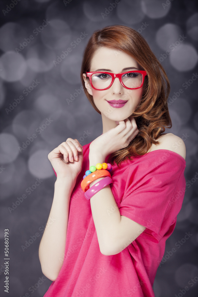 Beautiful red-haired girl at bokeh background Beautiful red-haired girl at bokeh background