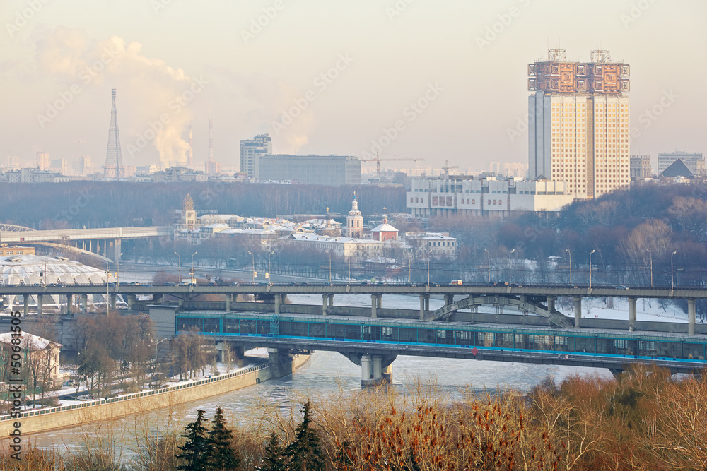 Luzhnetsky metro bridge in winter - two-story arched bridge