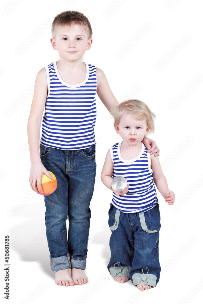 Two brothers in striped singlets and jeans with small balls Two brothers in striped singlets and jeans with small balls