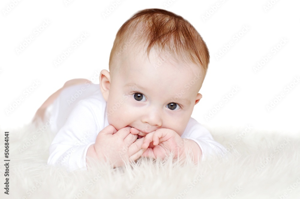 Portrait of the nice baby age of 6 months on white background Portrait of the nice baby age of 6 months on white background