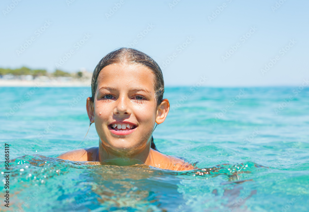Young girl in the sea