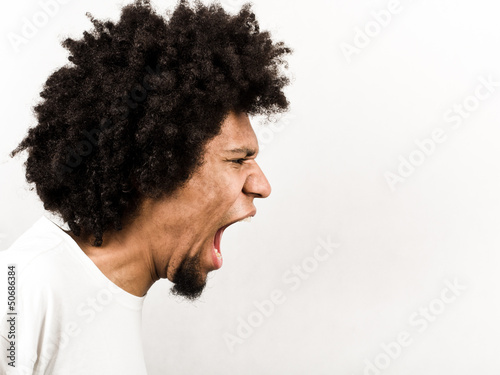 Emotional facial expression of man - scream