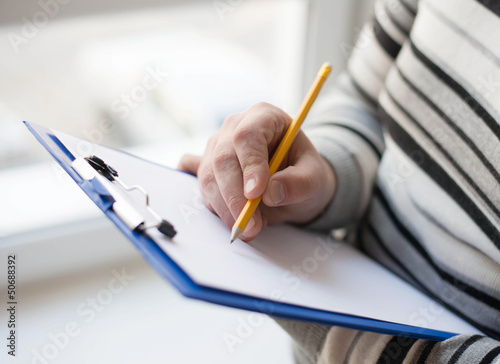 Businessman signing a document