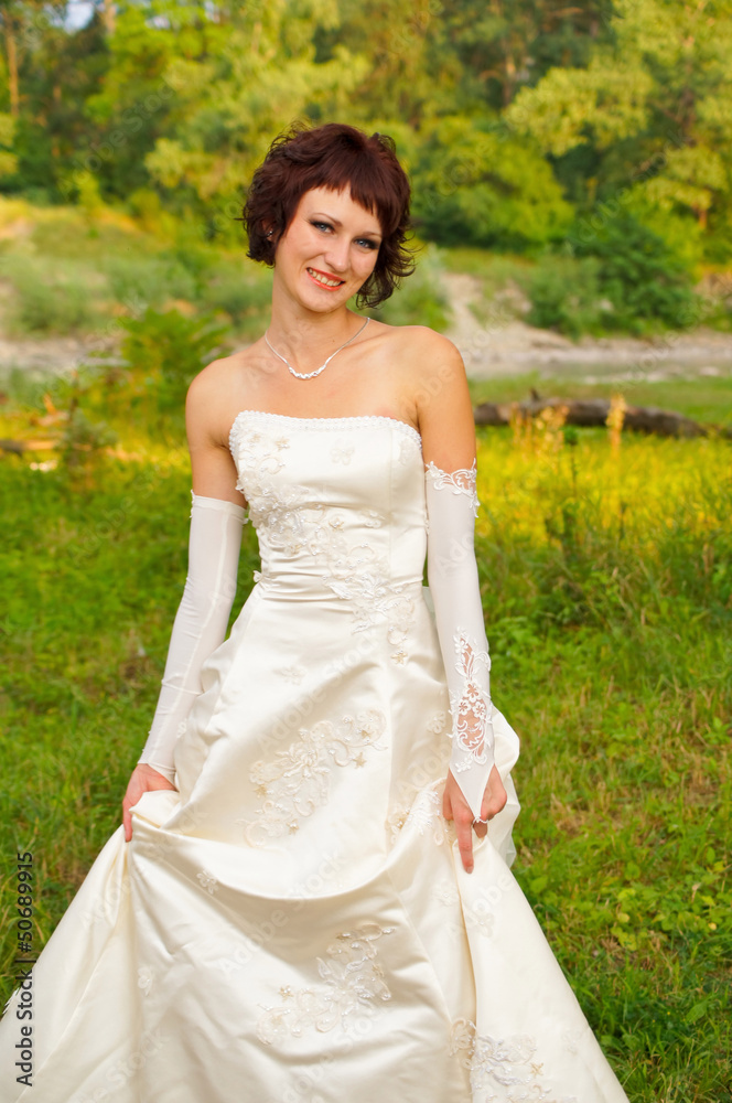 Cute little girl in a wedding dress Cute little girl in a wedding dress