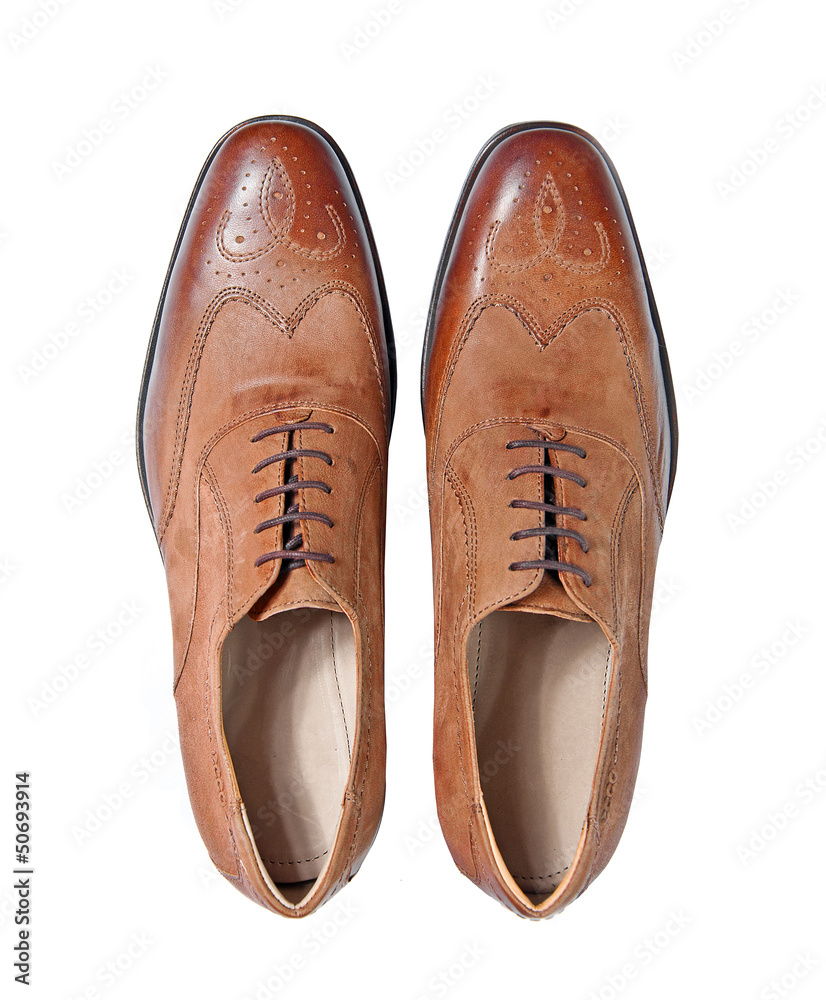 male brown leather shoes isolated on a white male brown leather shoes isolated on a white