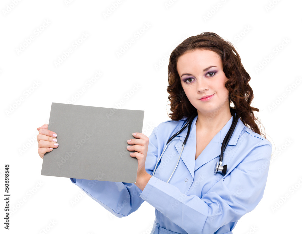 Smiling medical doctor holding blank clipboard Smiling medical doctor holding blank clipboard