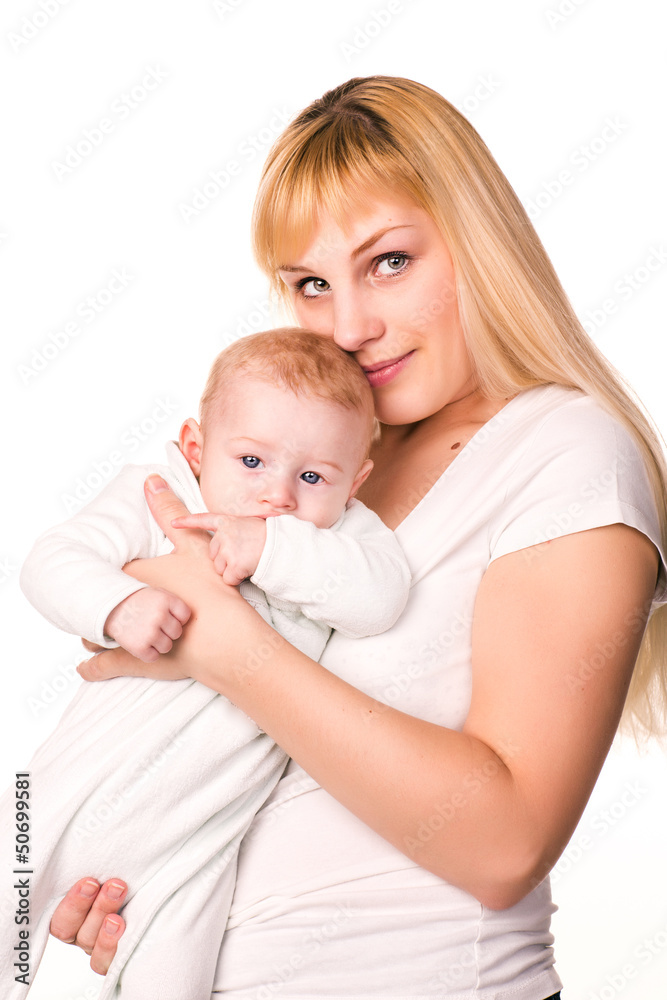 Young beautiful mother hugging cute little baby Young beautiful mother hugging cute little baby