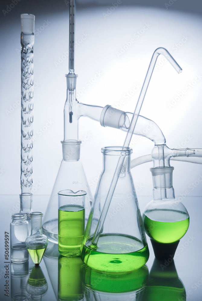 Laboratory glassware over white Laboratory glassware over white