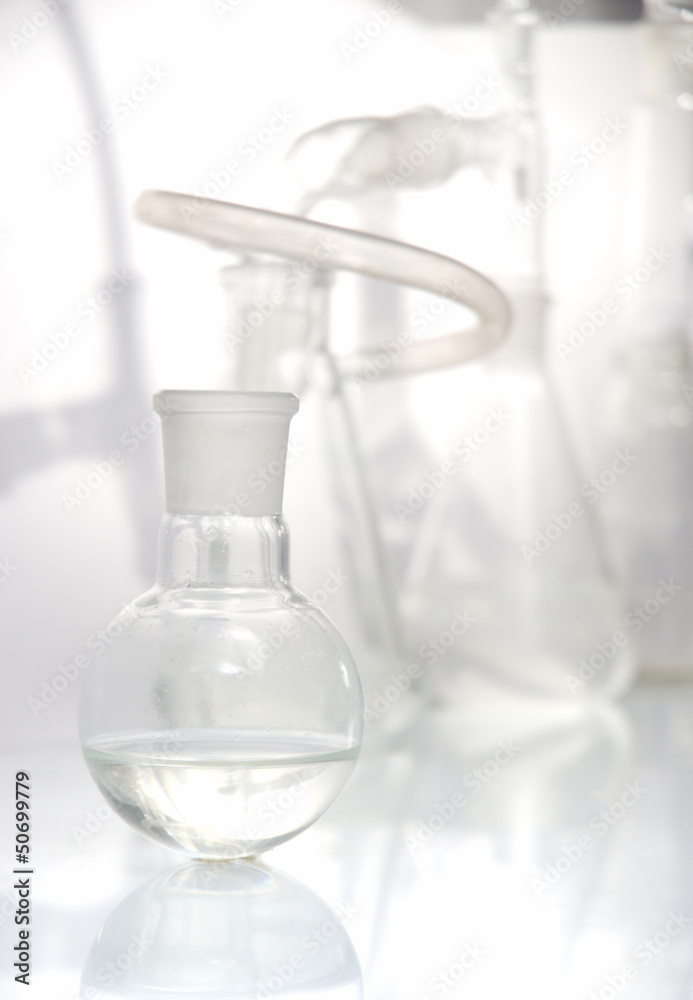 Laboratory glassware over white Laboratory glassware over white