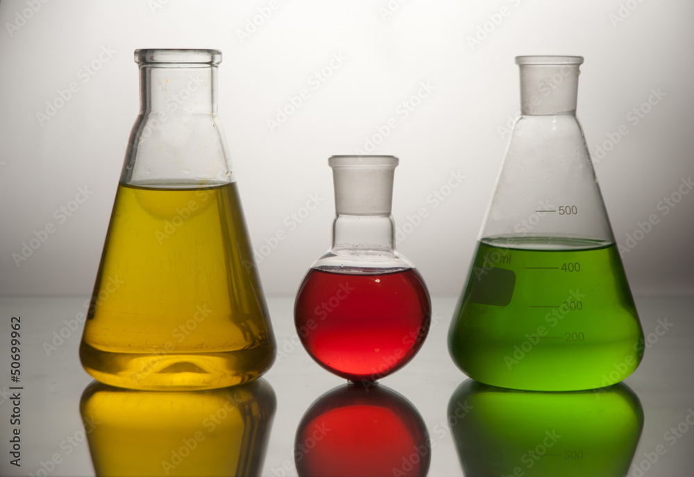 Laboratory glassware over white Laboratory glassware over white