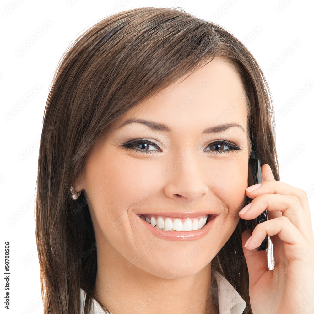 Happy businesswoman with cell phone, isolated Happy businesswoman with cell phone, isolated