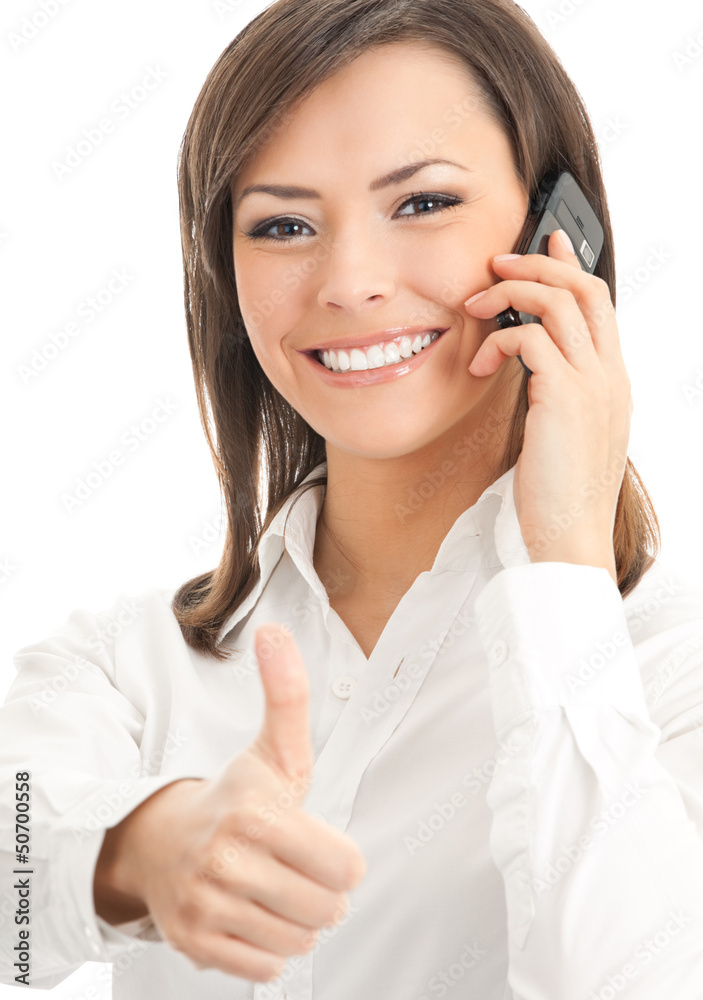 Happy smiling successful businesswoman with cell phone and thumb Happy smiling successful businesswoman with cell phone and thumb