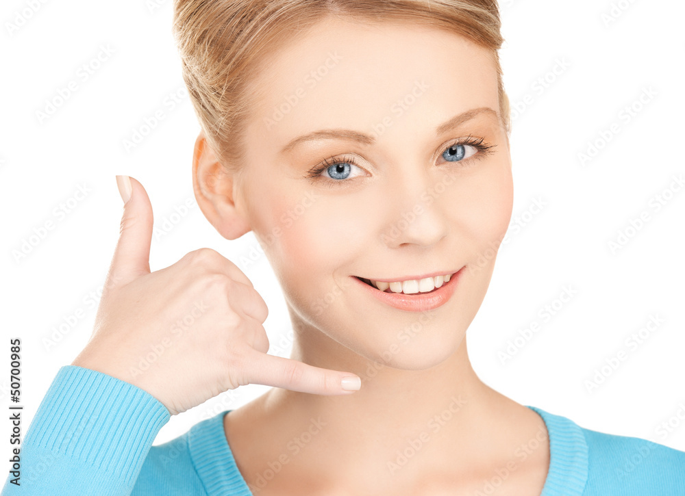 woman making a call me gesture woman making a call me gesture
