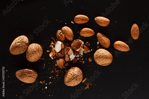 almond on black background