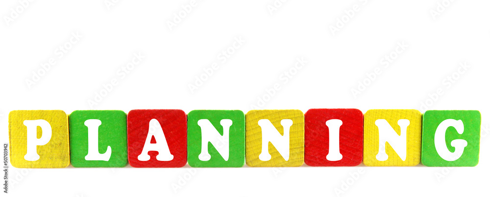planning - isolated text in wooden building blocks planning - isolated text in wooden building blocks