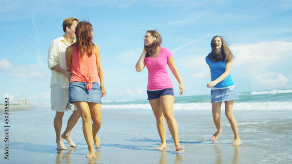 Happy Caucasian Family Splashing Ocean Shallows Happy Caucasian Family Splashing Ocean Shallows