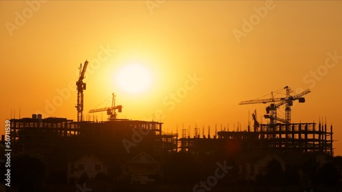 Construction site at sunset, time lapse
