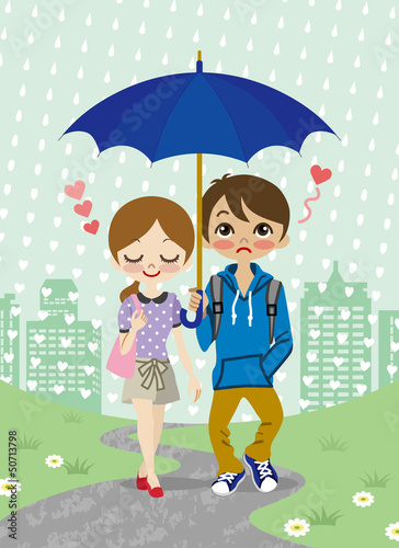 Young Couple walking in the rainy town