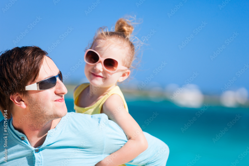 Father and daughter at beach