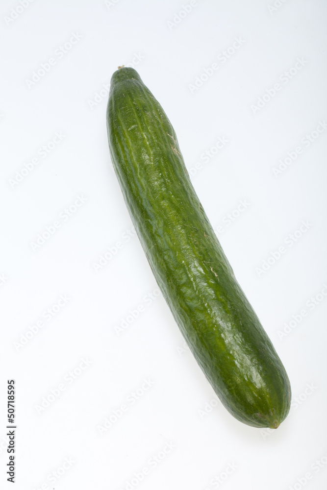 The green cucumber isolated on white background The green cucumber isolated on white background