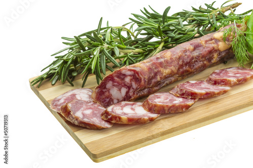 Salami with rosemary, basil and tomato