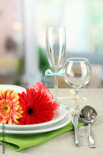 Table serving on bright background
