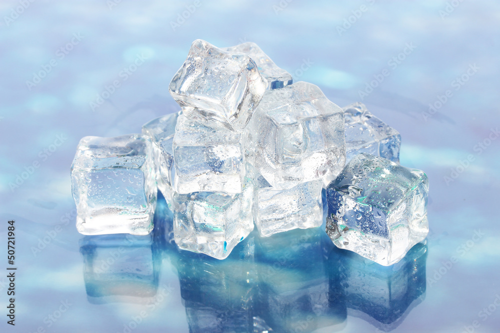 Ice cubes on the background water Ice cubes on the background water