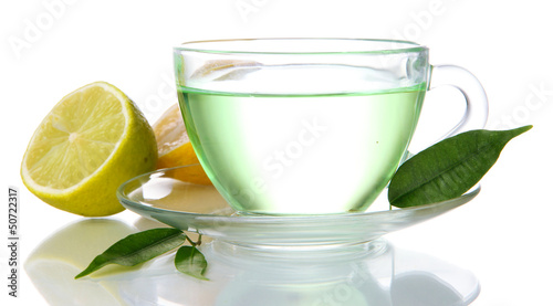 Transparent cup of green tea with lemon, isolated on white