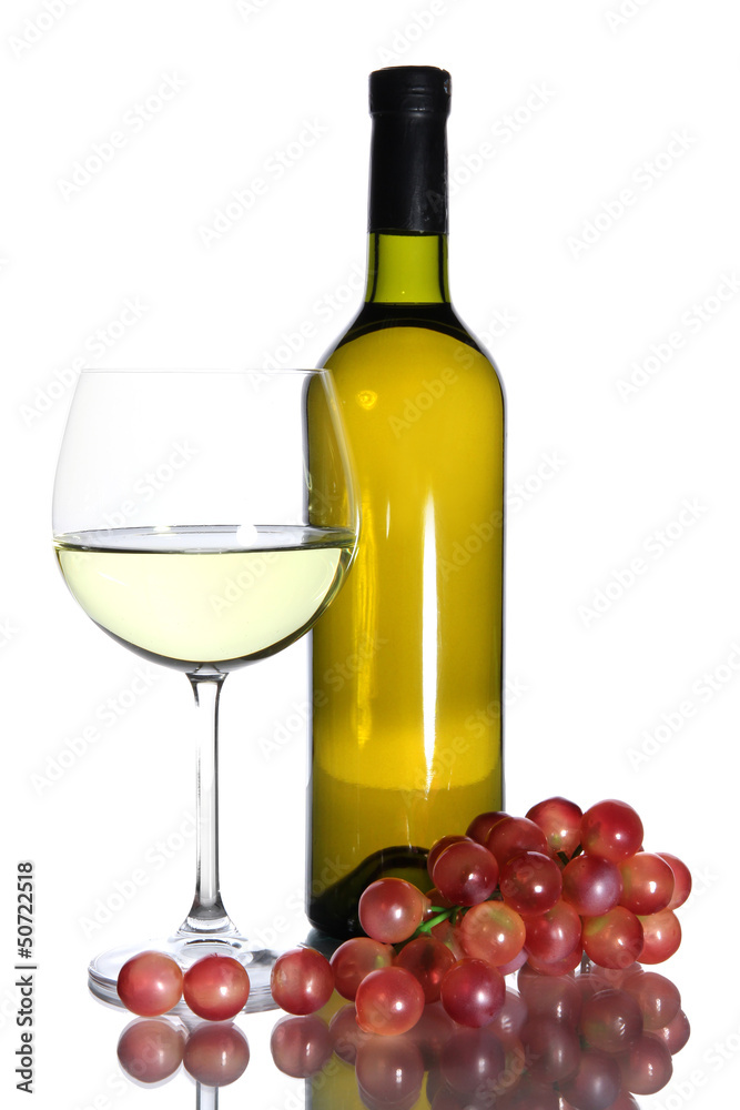 White wine glass and bottle of wine isolated on white White wine glass and bottle of wine isolated on white
