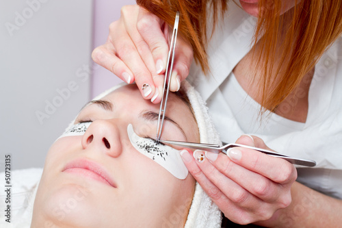 beautiful young woman eyelash extension