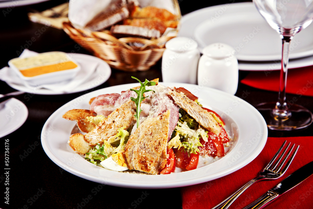 Caesar salad served on plate Caesar salad served on plate