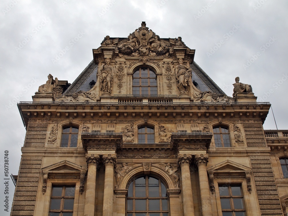 Facade of Louvre. Art museum. France. June 19, 2012.