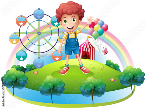 A boy near an amusement park