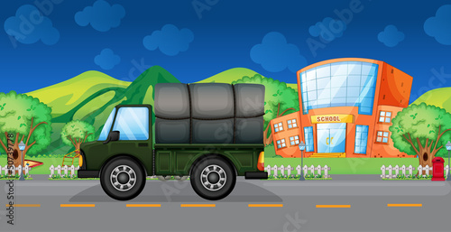 A cargo truck near the school