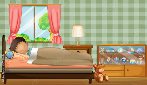 A boy sleeping soundly inside his room
