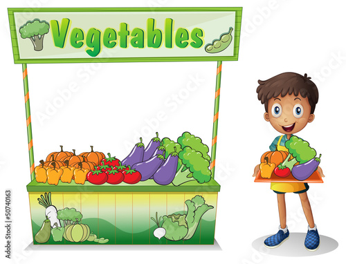A boy selling vegetables