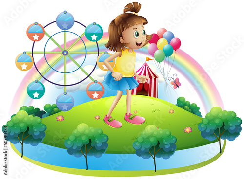 A young girl at the amusement park