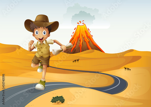 A boy running along the street holding a rolled paper