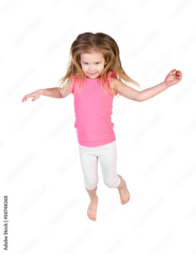 Adorable little girl jumping in air isolated Adorable little girl jumping in air isolated