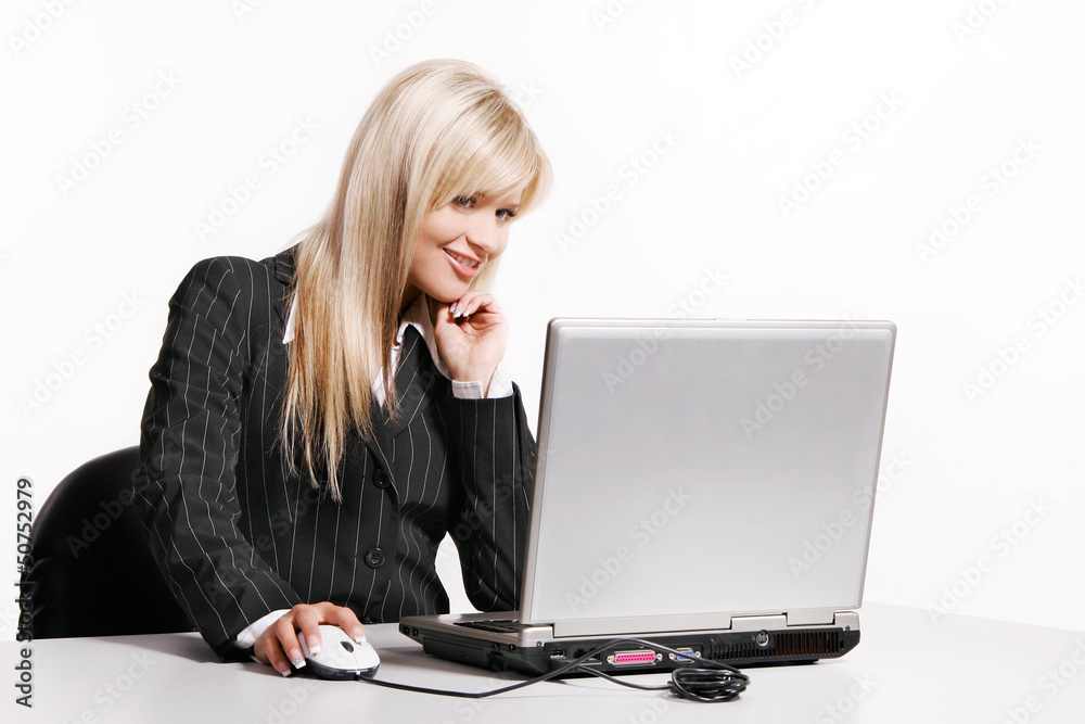 Beautiful young woman working with laptop