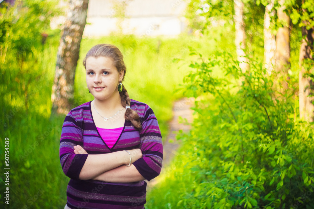A Beautiful Young Girl Standing On A Forest Path Road A Beautiful Young Girl Standing On A Forest Path Road