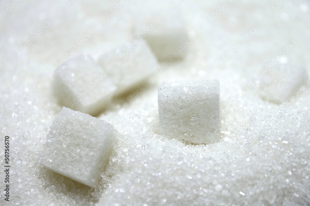 close up of sugar cubes on white background close up of sugar cubes on white background