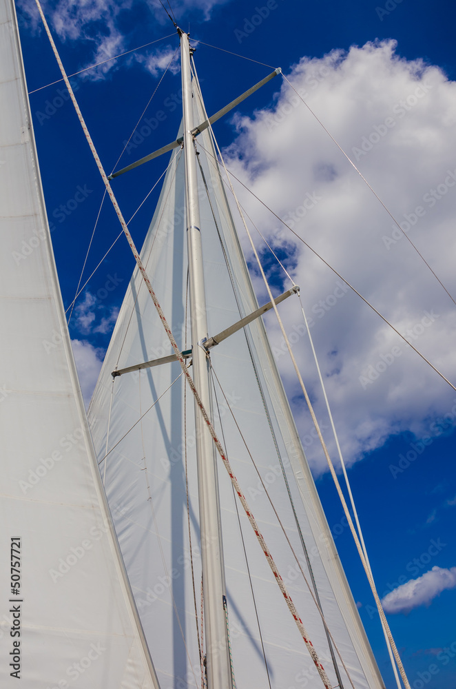 White Sail Against Blue Sky