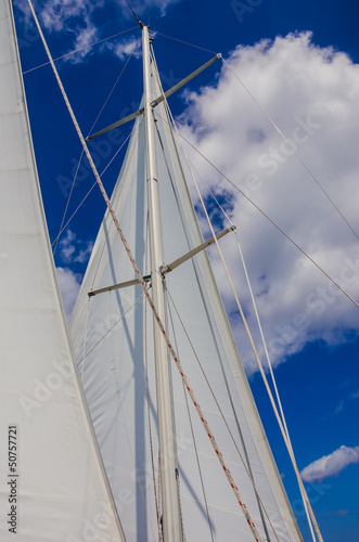 White Sail Against Blue Sky © alpegor